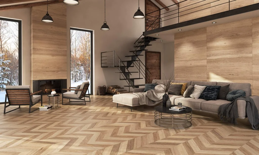 Gresie imitație lemn în model chevron într-un living modern și cald